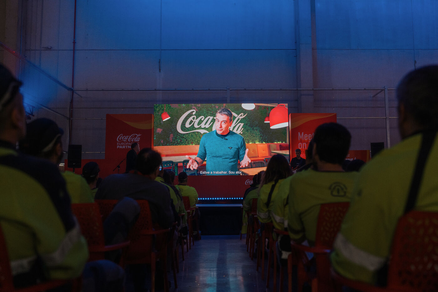 Video screen on stage at the Coca-Cola opening event