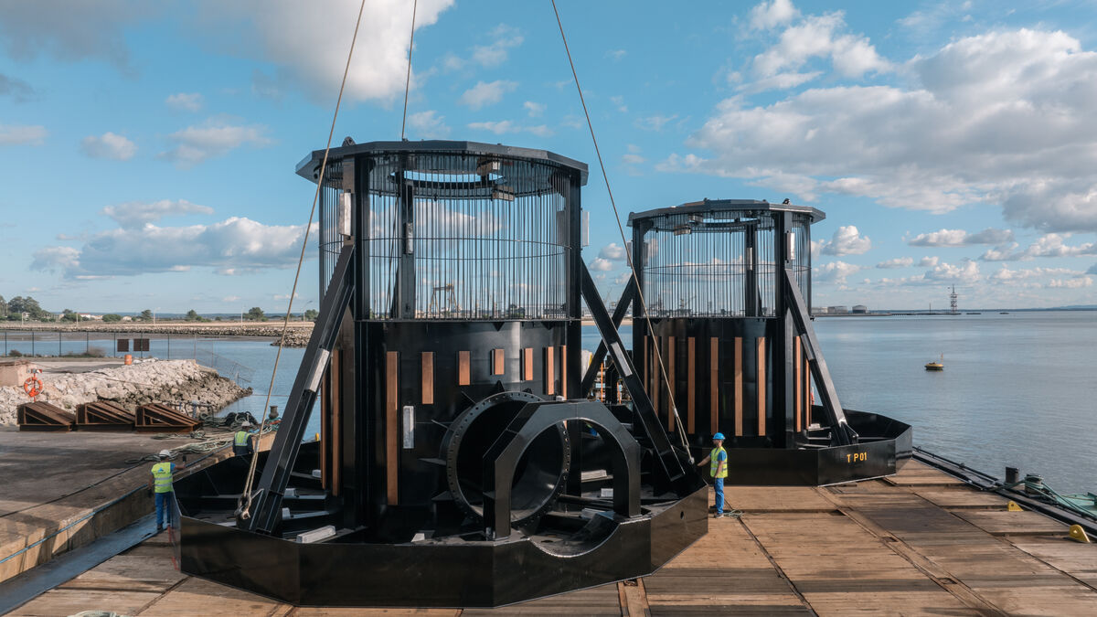 Aerial drone view of two large Etermar steel structures on the quay by the Sado river, Setúbal