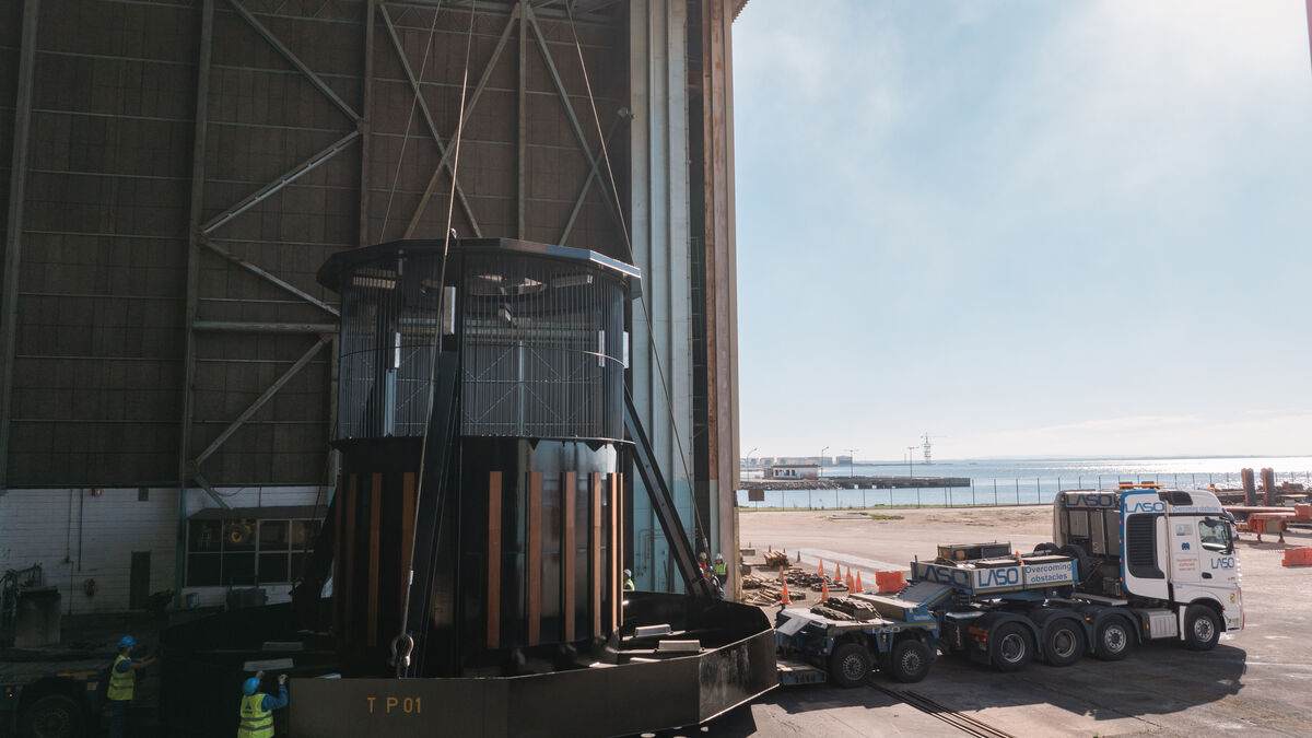 Large steel structure with workers alongside for scale, Etermar workshop