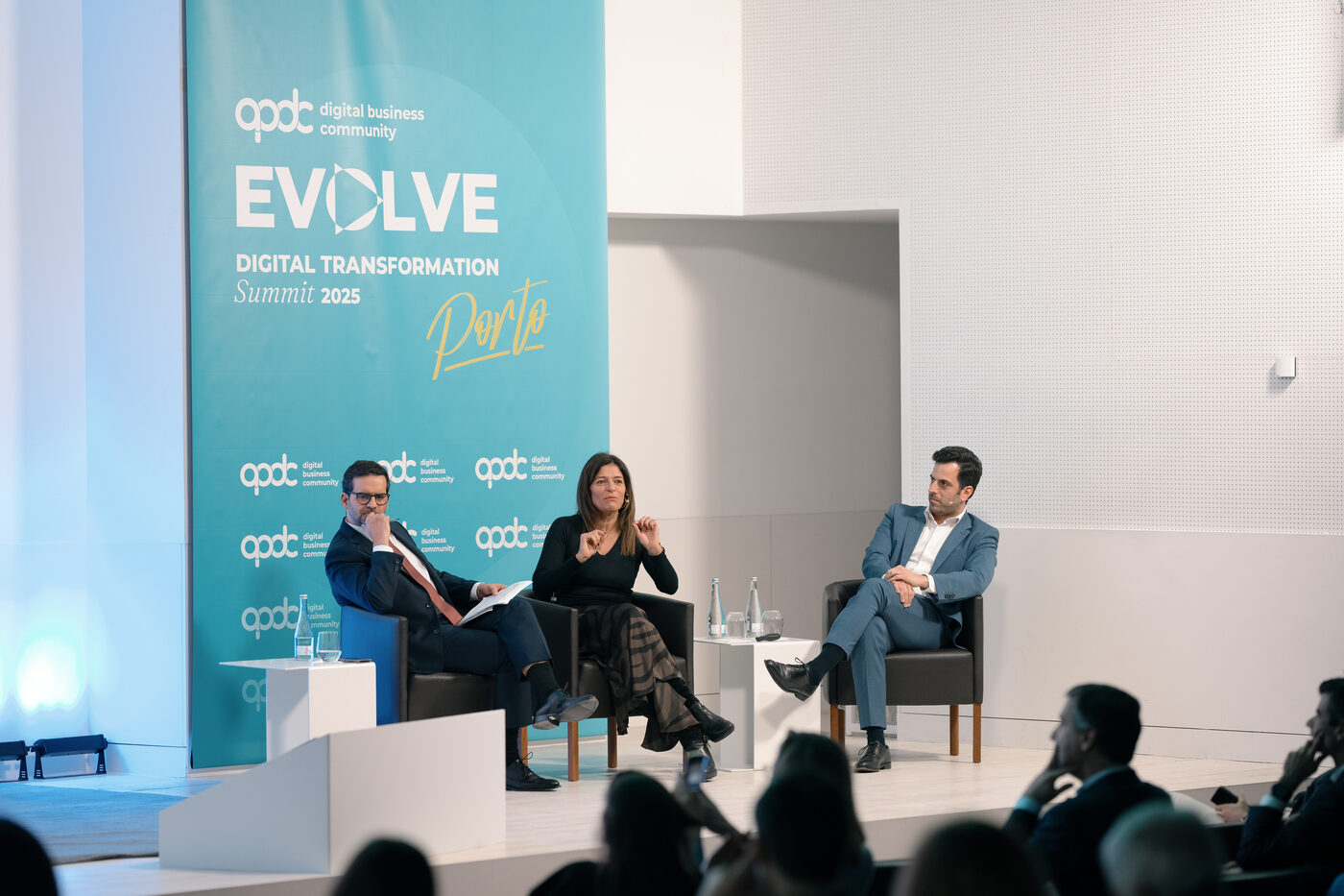 Speaker panel at the EVOLVE Summit in Porto, corporate event photography
