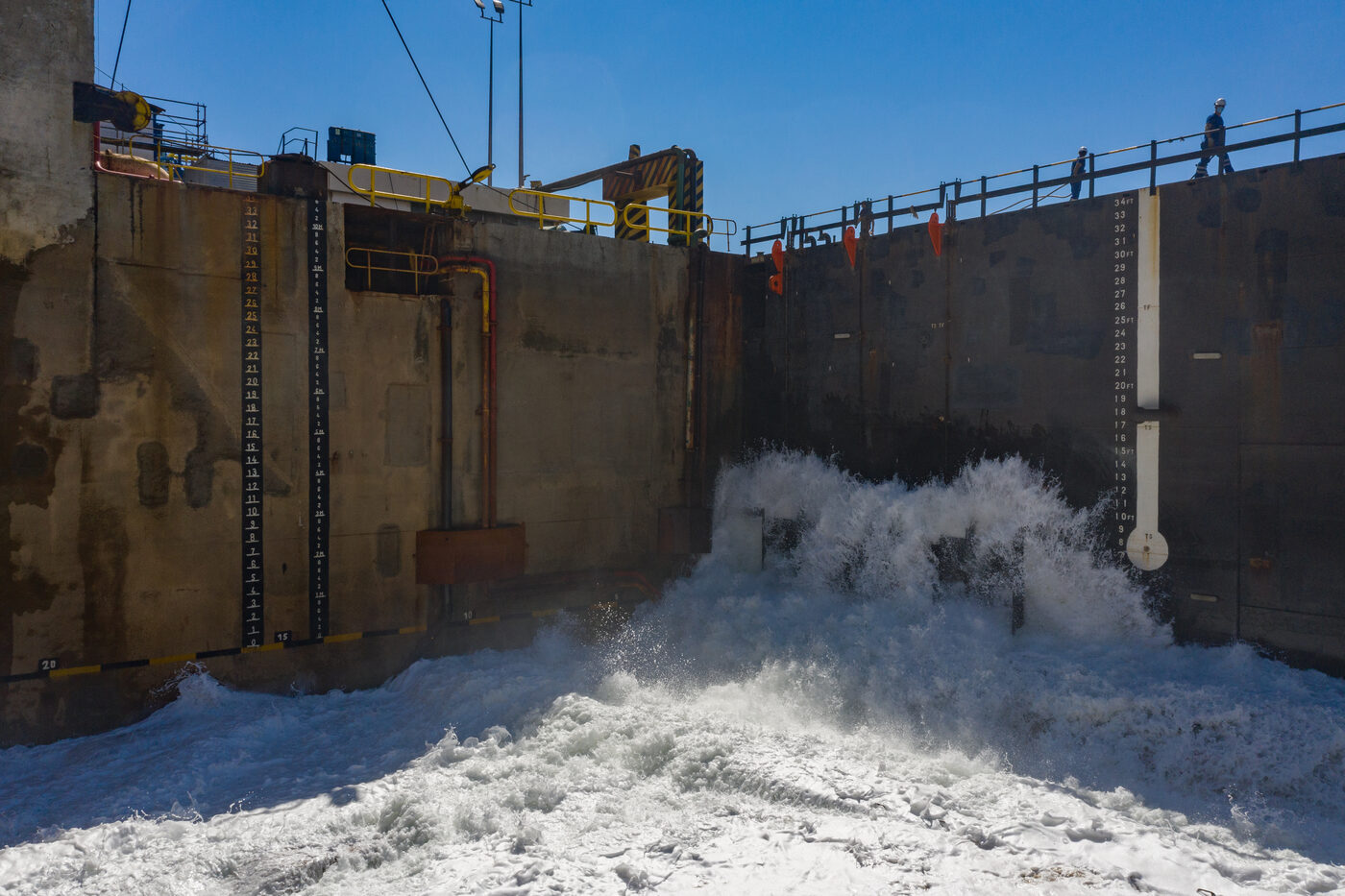 Flooding of the Lisnave dry dock with water entering to refloat the ship, aerial view
