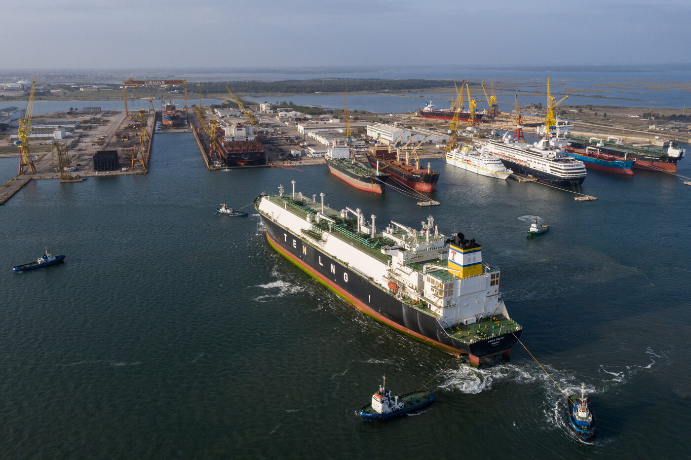 Maria Energy LNG carrier (Tsakos Energy Navigation, TEN) towed into the dry dock at the Lisnave shipyard in Setúbal, aerial drone view
