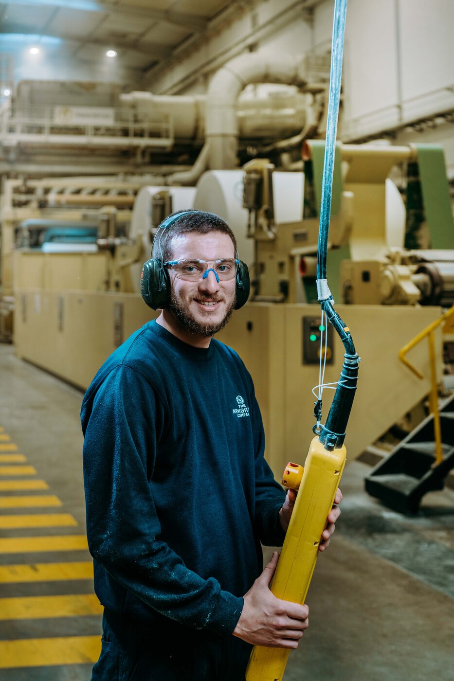 Portrait of a worker in their real environment at the Navigator mill