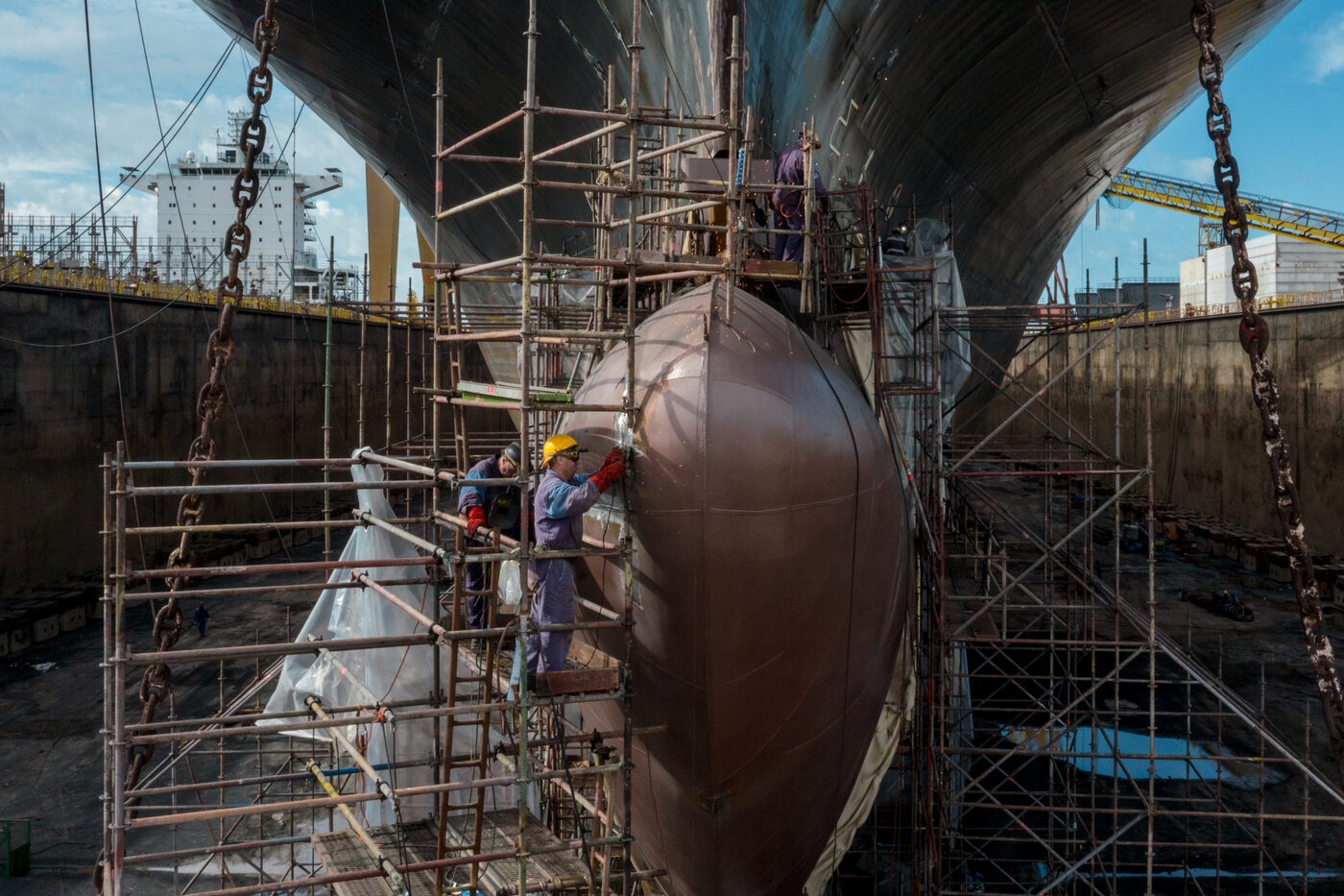 Ship in dry dock seen from a drone during the bulbous bow retrofit at the Lisnave shipyard, Setúbal