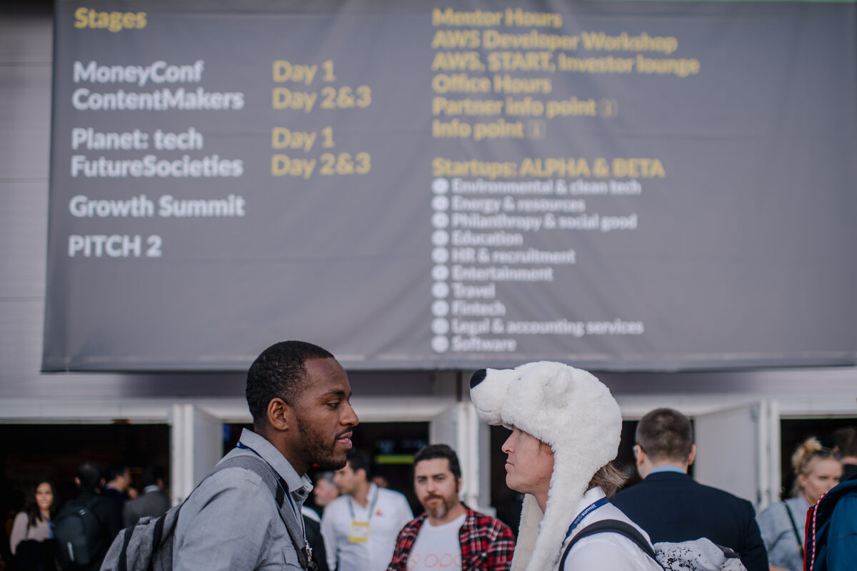 Board with the agenda and stages of Web Summit in Lisbon